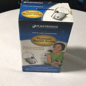 Plantronics telephone headset system. Connects to single phone line. Hands free